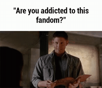 Man Holding Paper Asking If Addicted To Fandom GIF
