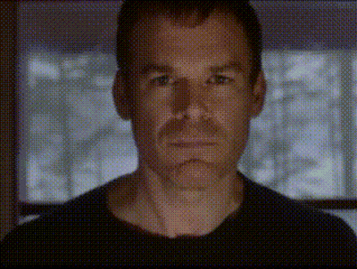 Man Holding Paper At Table With Microphone GIF