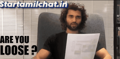 Man Holding Paper In Front Of Are You Loose Sign GIF