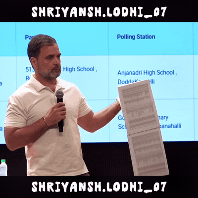 Man Holding Paper In Front Of Polling Station GIF