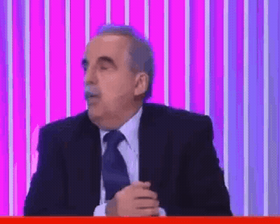 Man Holding Paper Looking At It GIF