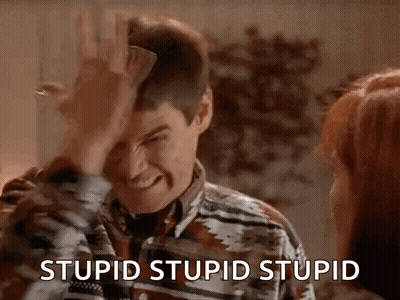 Man Holding Paper Making Funny Face GIF