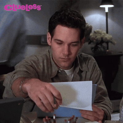 Man Holding Paper Saying Clueless GIF