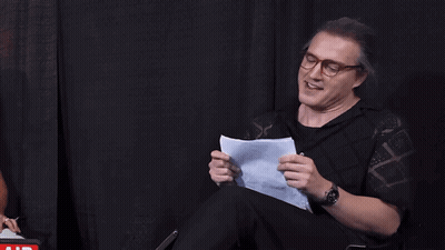 Man Holding Paper Saying I Haven't Thrust In Years GIF