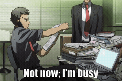 Man Holding Paper Saying Not Now I'm Busy GIF