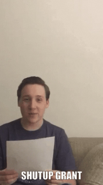 Man Holding Paper Saying Shutup Grant GIF