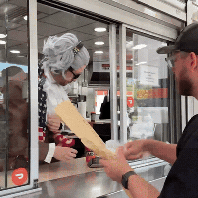 Man Holding Paper Saying Steak GIF