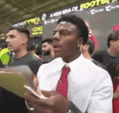 Man Holding Phone Saying New Era Of Roots GIF