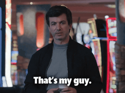 Man Holding Phone Saying That's My Guy GIF
