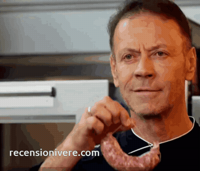 Man Holding Piece Of Meat With Reviewonivere.com Logo GIF