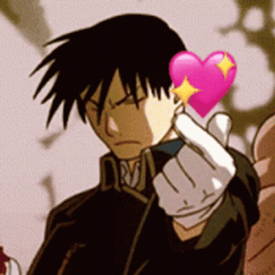Man Holding Pink Heart With Yellow Star GIF