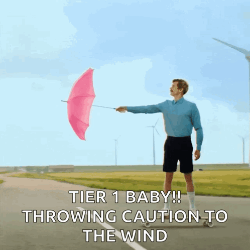 Man Holding Pink Umbrella Saying Tier 1 Baby Throwing Caution To The Wind GIF