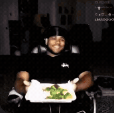 Man Holding Plate Of Broccoli GIF