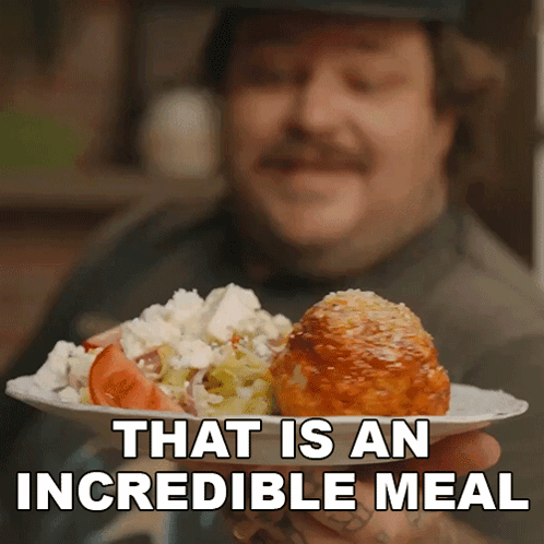 Man Holding Plate Of Food That Is An Incredible Meal GIF