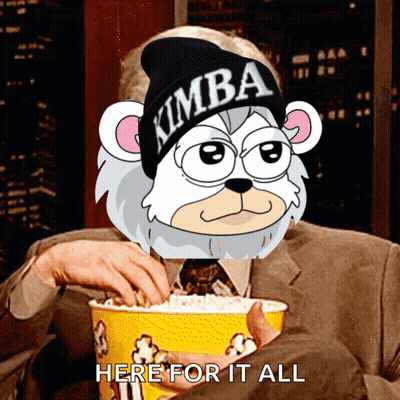 Man Holding Popcorn With Cartoon Character In Kimba Hat GIF