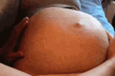 Man Holding Pregnant Belly GIF