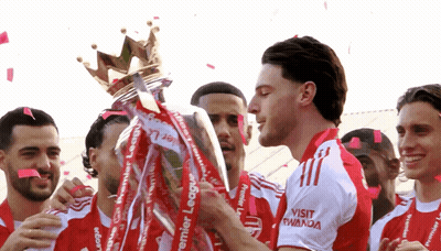 Man Holding Premier League Trophy GIF