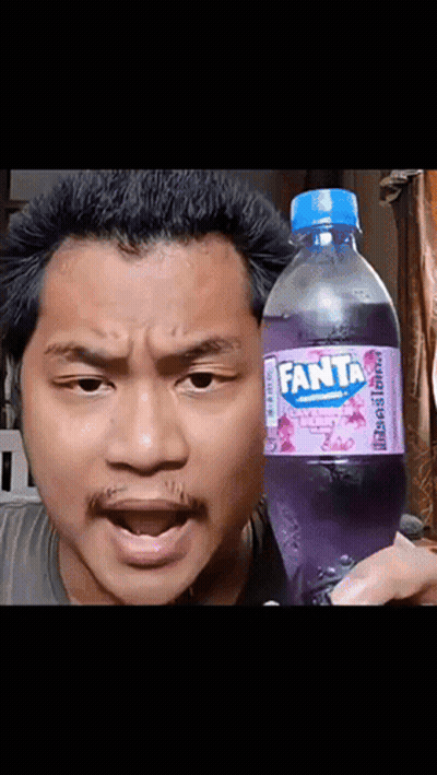 Man Holding Purple Fanta Bottle GIF