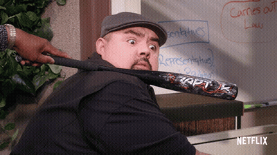 Man Holding Raptor Baseball Bat In Front Of Whiteboard Saying Carries Out GIF