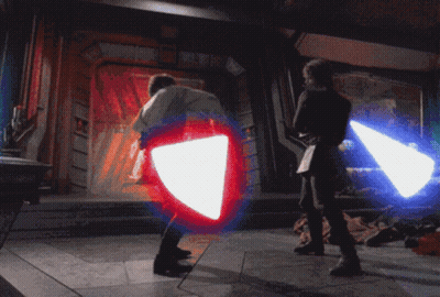 Man Holding Red And Blue Lightsaber GIF