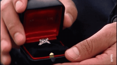 Man Holding Red Box With Diamond Ring GIF