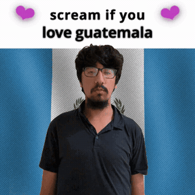 Man Holding Red Heart Saying Radical Dreams GIF