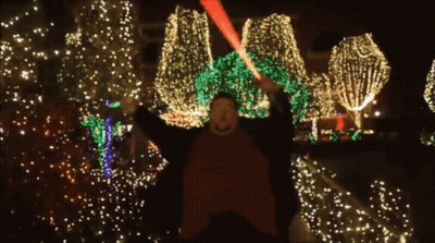 Man Holding Red Lightsaber GIF