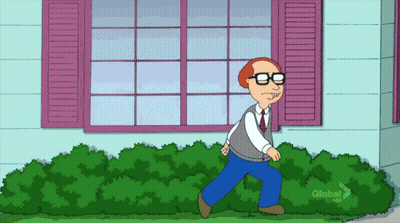 Man Holding Red Rose On Couch GIF