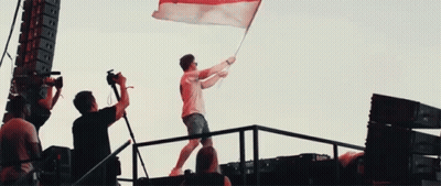 Man Holding Red White Blue Flag GIF