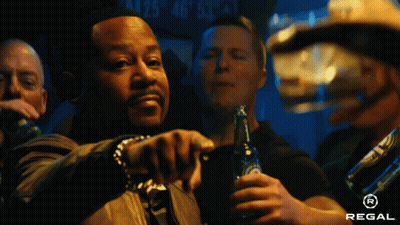 Man Holding Regal Beer Pointing GIF