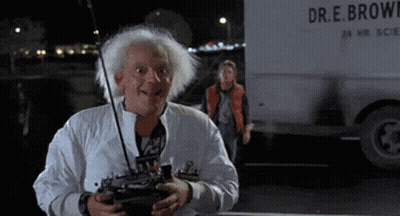 Man Holding Remote In Front Of Truck Saying Dr.E. Brown GIF