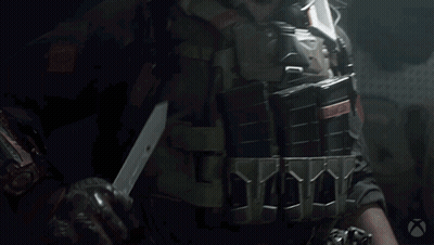 Man Holding Rifle With Silencer