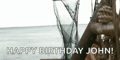 Man Holding Rope In Front Of Boat Says Happy Birthday John GIF