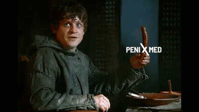Man Holding Sausage Saying Penis Med GIF