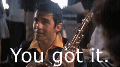 Man Holding Saxophone Saying You Got It GIF