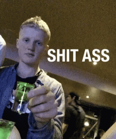 Man Holding Shot Glass Saying Shit Ass GIF