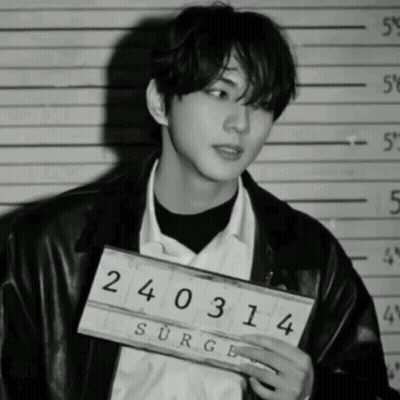Man Holding Sign 240314 GIF