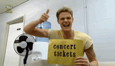 Man Holding Sign Concert Tickets GIF