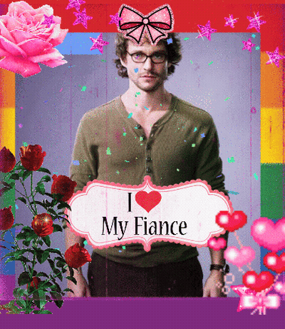 Man Holding Sign I Heart My Fiance GIF