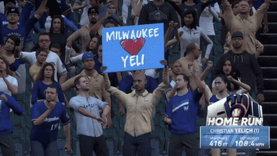 Man Holding Sign Milwaukee Yeli GIF