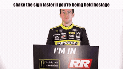 Man Holding Sign Saying I'm In GIF