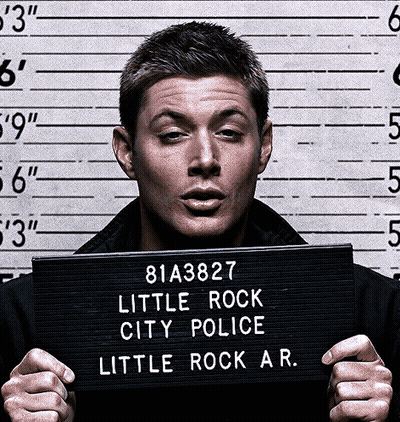 Man Holding Sign Saying Little Rock City Police GIF