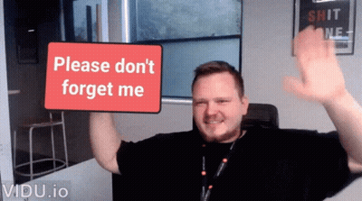 Man Holding Sign Saying Please Don't Forget Me GIF