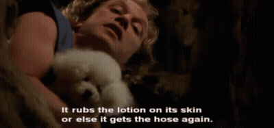 Man Holding Small White Dog GIF