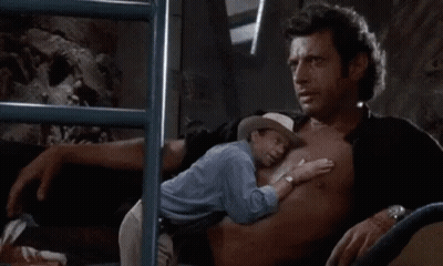 Man Holding Smaller Man GIF