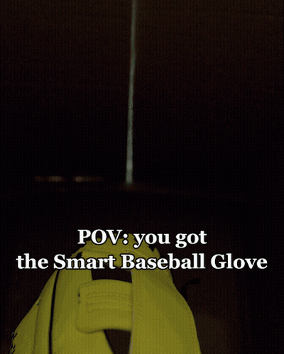 Man Holding Smart Baseball Glove GIF
