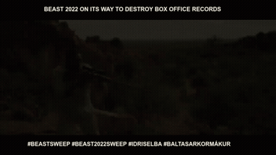 Man Holding Sniper Rifle In Desert GIF