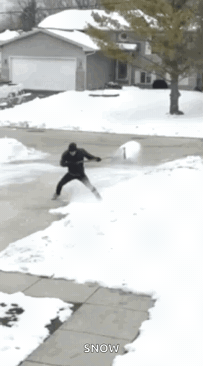 Man Holding Snowball GIF