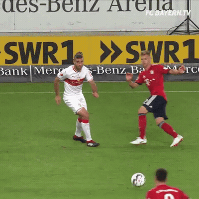Man Holding Soccer Ball In Purple Apollo Tyres Jersey GIF