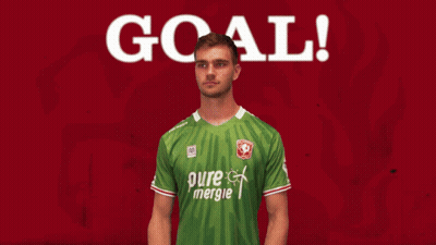 Man Holding Soccer Ball On Red Background Saying Goal GIF
